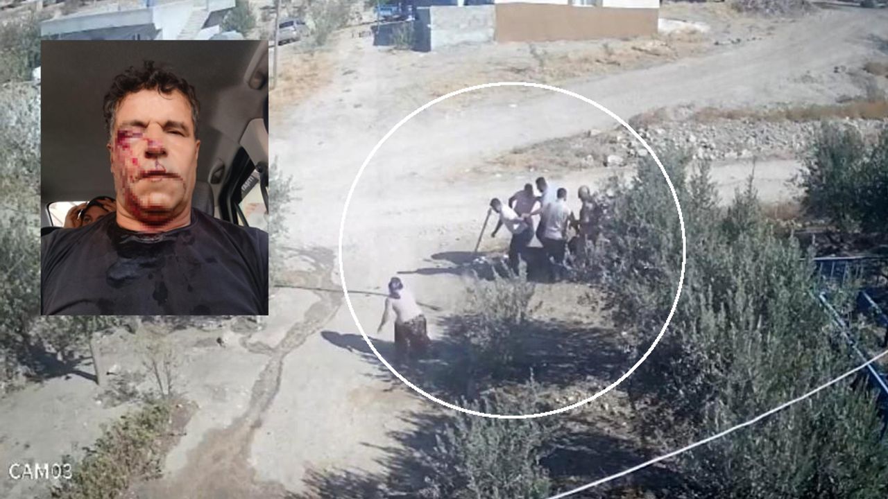 Kafası taşla ezilmek istenen baygın kocasını saldırganlara taş atarak kurtardı