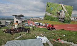 Kontrolden çıkan otomobil atletizm sahasına düştü