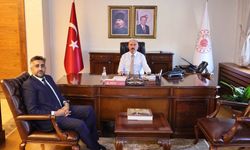 Doç. Dr. Gömeç’in ilk  ziyareti Vali Çalgan’a