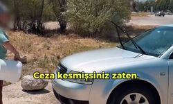 Pişkinliğin böylesi: Uyarıya rağmen arabasını yıkamaya devam etti!