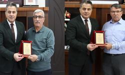 Emekliye ayrılan Erol Çatal ve Erdoğan Arslan’a plaket