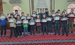 Öğrencilere Kur’an-ı Kerim hediye edildi