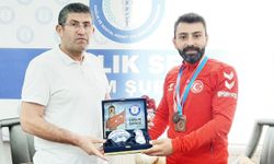 Saatcı, Özsoy’u tebrik etti