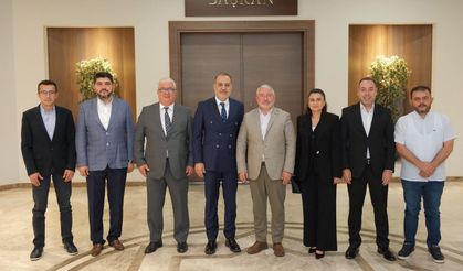 Gökhan Kerman ve arkadaşları Başkan Aşgın’ı ziyaret ettiler