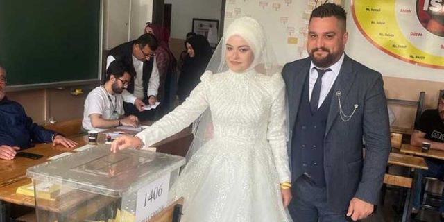 Damatlık ve gelinlikle oy kullanmaya gittiler