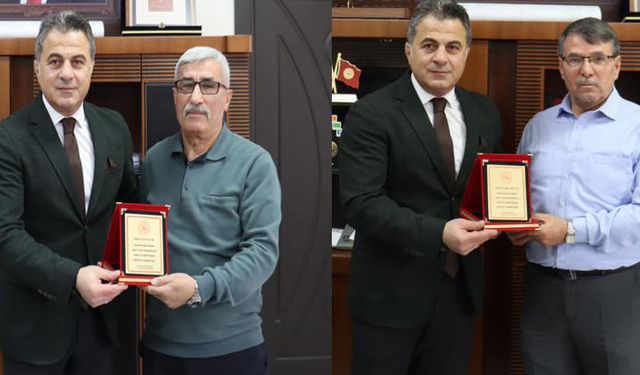 Emekliye ayrılan Erol Çatal ve Erdoğan Arslan’a plaket