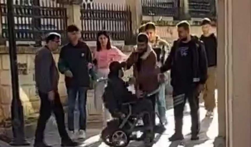 Görevliye hem iftira  hem yumruk atmış