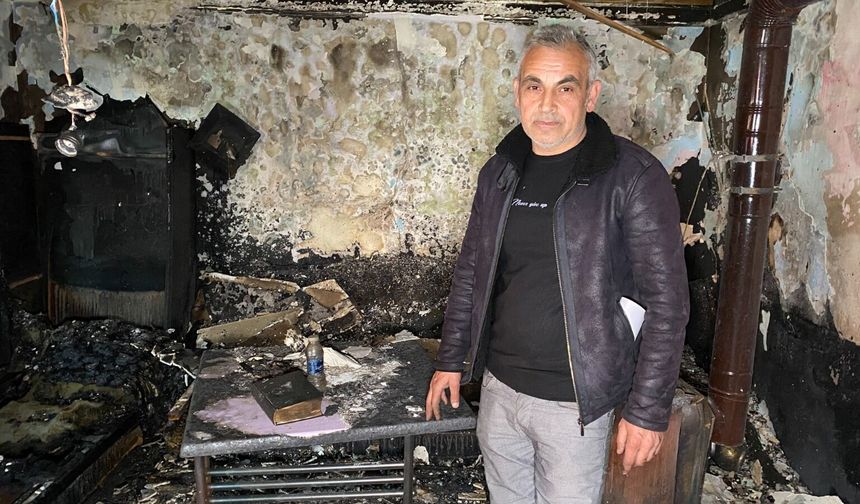 Yangında kullanılamaz hale gelen gecekonduda Kur'an-ı  Kerim meali zarar görmedi