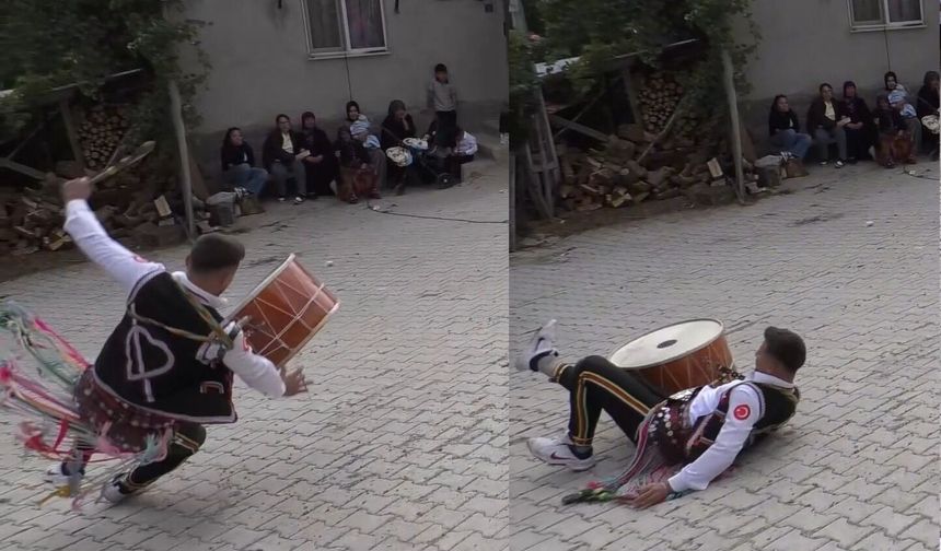 Davulcu yere düştü, gösteriyi bırakmadı